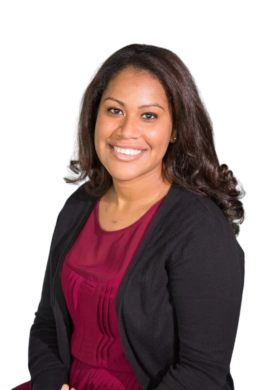business woman wearing a black cardigan smiling